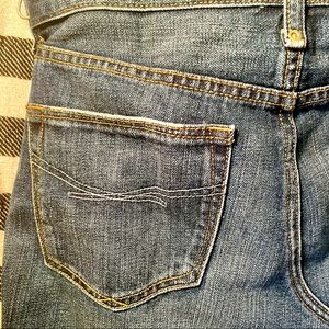 Distressed GAP jean mini skirt. 13” in length size 28/6.